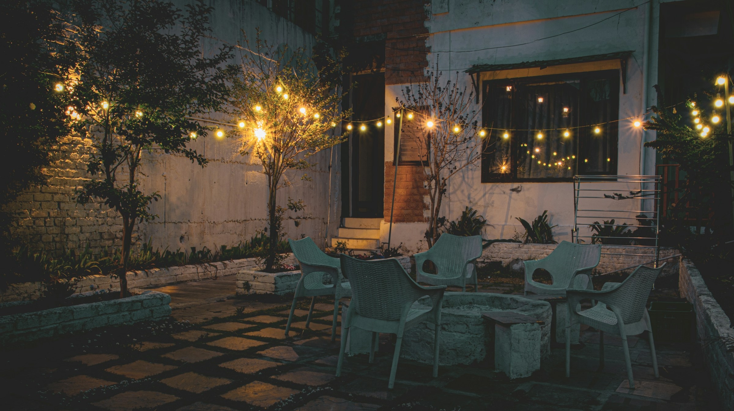 Outdoor patio lighting with string lights in Asheville North Carolina home